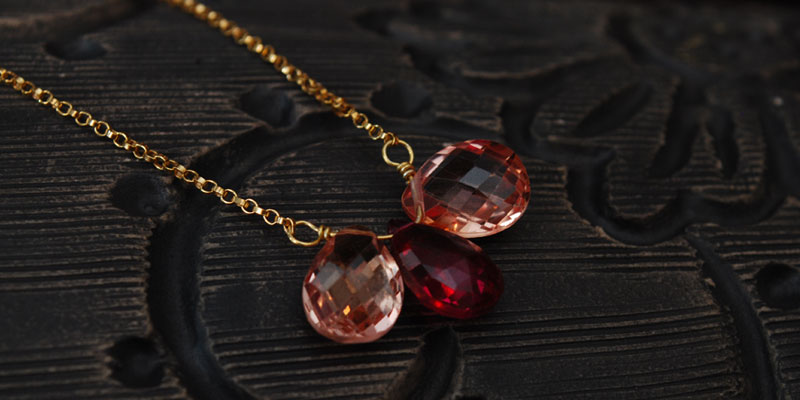 beautiful red and orange sapphire faceted pear shaped briolettes